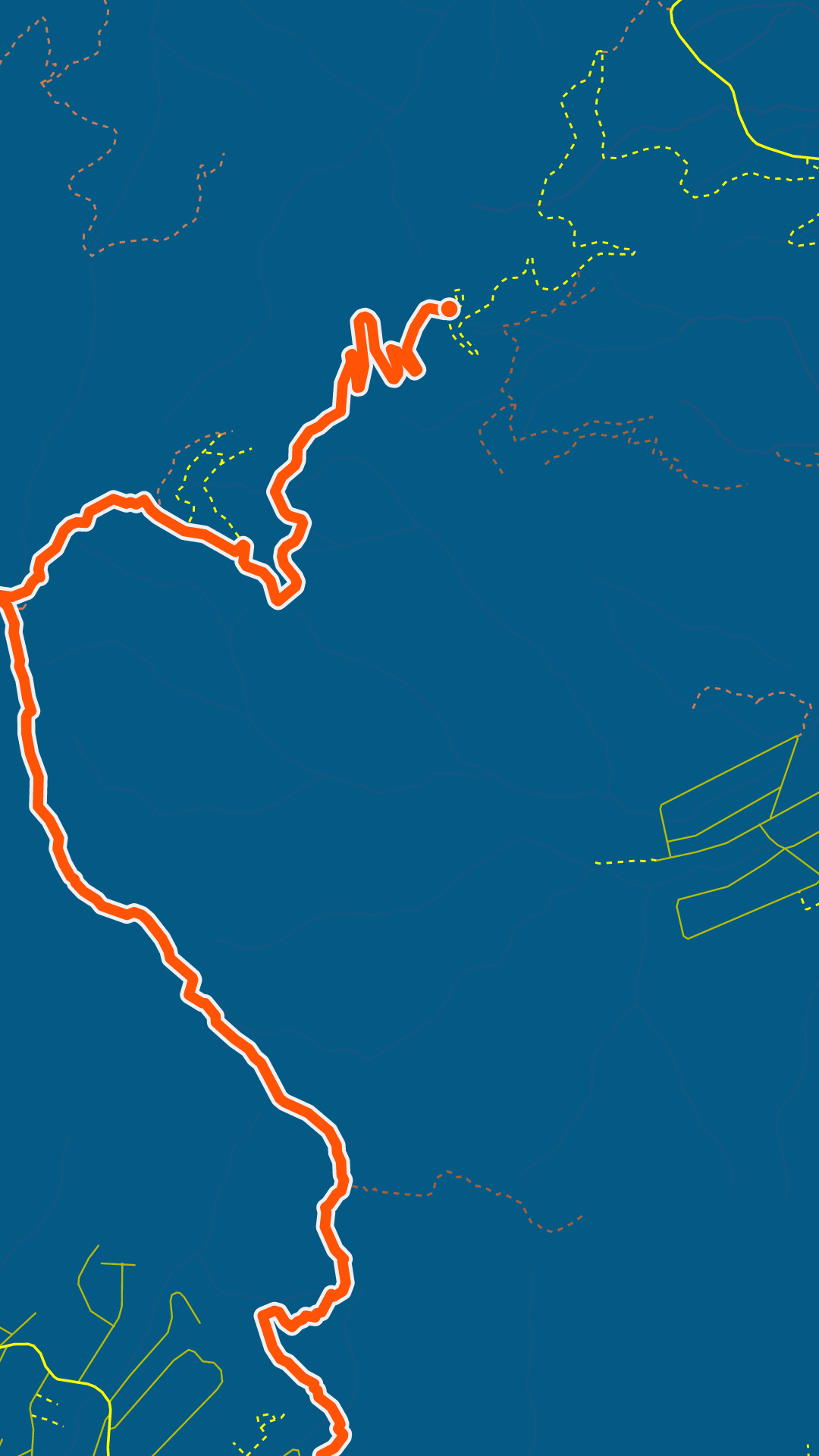 A frame from the Mont-Dore film, in New Caledonia: the orange route draws itself on blue, between dotted trails and roads coming into view.